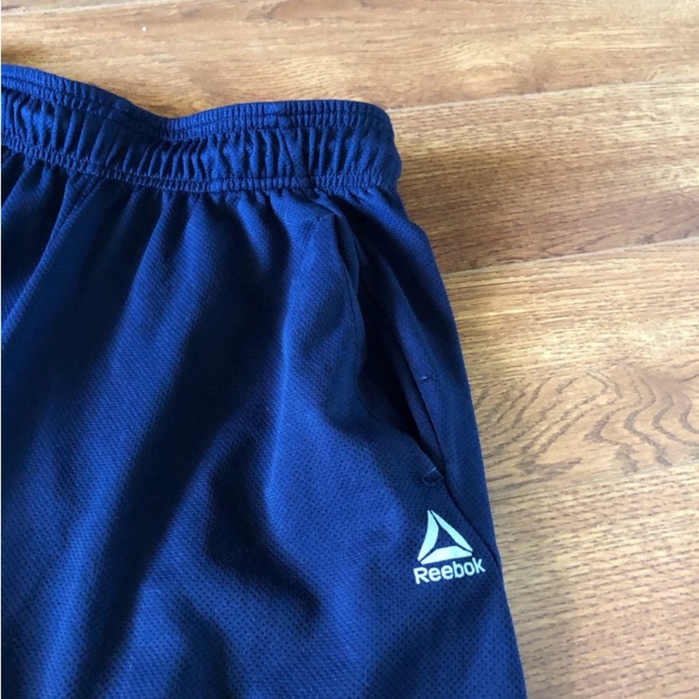 Reebok athletic navy shorts in size S